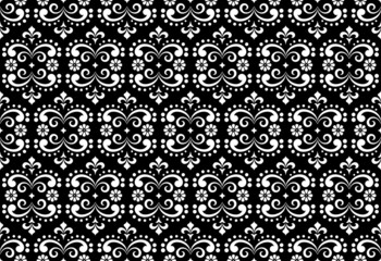 Wallpaper in the style of Baroque. Seamless vector background. White and black floral ornament. Graphic pattern for fabric, wallpaper, packaging. Ornate Damask flower ornament