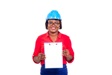 beautiful female engineer holding a clipboard smiling.