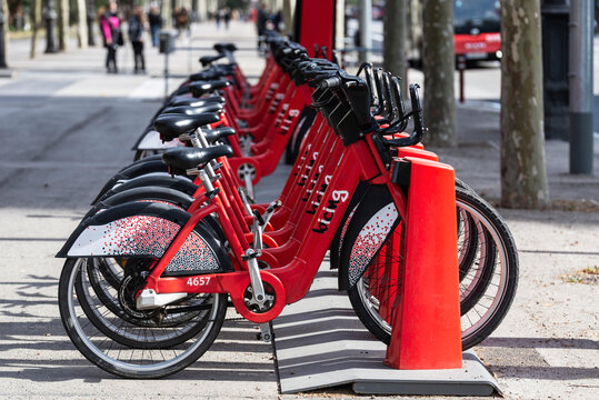 A row of rental electric bikes in Barcelona, Spain