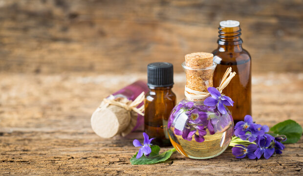 Violet essential oil in the bottle