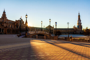 Fototapeta na wymiar Plaza of Spain in Seville. The capital of Andalusia at dawn. Architectural beauty of the city.