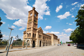 Fototapeta na wymiar Clock tower of Toledo railway station exterior. Spain