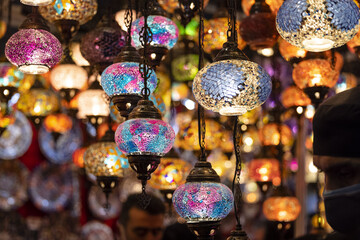 Selective focus shot of oriental colorful glass lamps