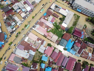 Aerial view of Situation Flood in sangatta city, east kutai, east Kalimantan, Indonesia in 21 March 2022. Floods hit homes and highways, disrupting transportation,  floods because high rainfall.