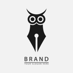 owl eye paired with ballpoint pen for logo icon study.