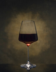 Glass of red wine with reflection