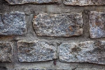Gray stone wall and rocks