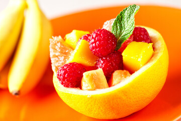 Fruit Salad in Half Grapefruit with Mint Leaf