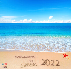 Fototapeta na wymiar Welcome to Spring 2022 on the beach
