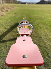 Vertical shot of seesaw on the field
