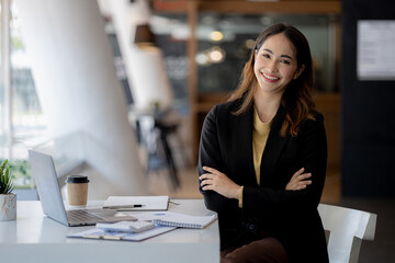 Beautiful Asian woman is a businesswoman who leads a new generation of startups, a woman who runs...