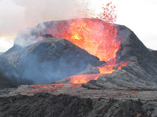 Shot of lava erupting at the volcano - Natural disaster