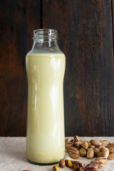 Vegetable milk in a glass bottle