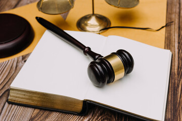 justice and law concept.Male judge in a courtroom on wooden table and Counselor or Male lawyer...
