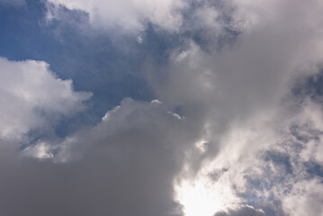 Fototapeta na wymiar White-gray clouds in the blue sky.