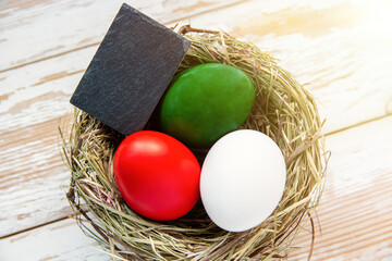 Happy Easter holiday card, Easter eggs as the color of the Italian flag red, white, green.	