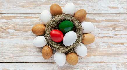 Happy Easter holiday card, Easter eggs as the color of the Italian flag red, white, green.	