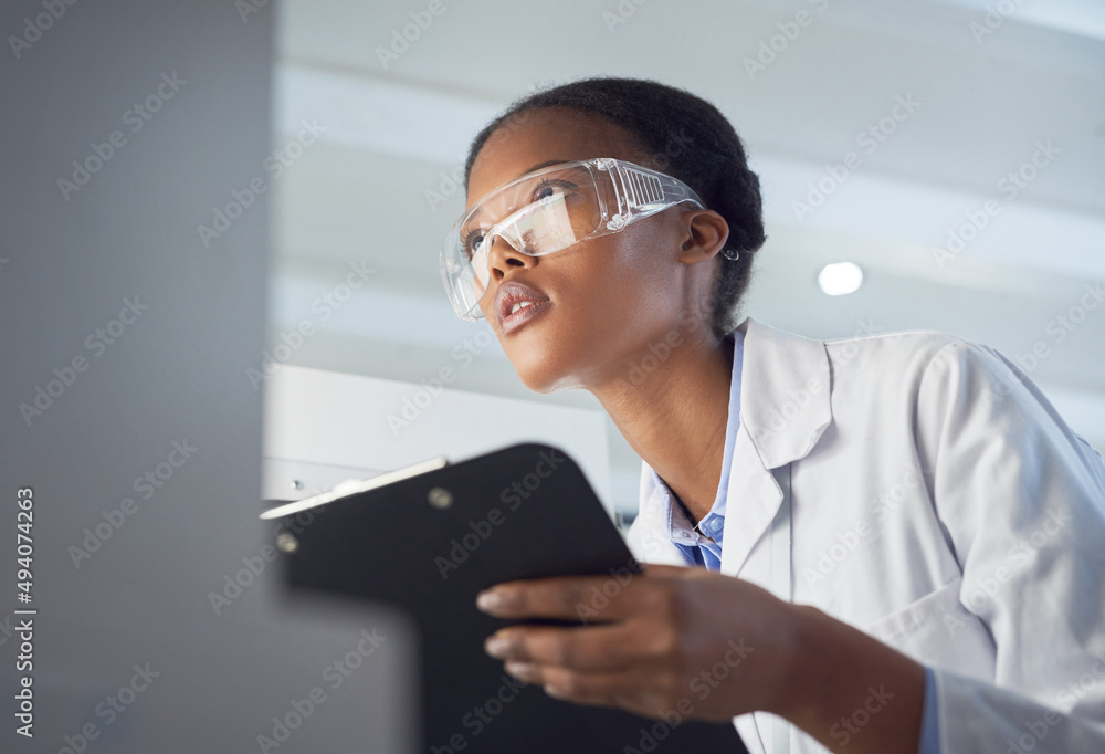 Poster Every contribution is a contribution that matters. Shot of a young scientist using a computer while conducting research in a laboratory.
