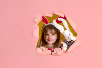 Cute little girl on Easter holiday with a rabbit costume