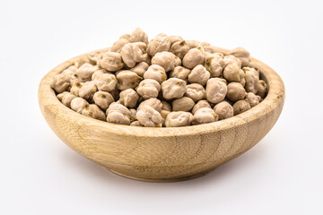 raw chickpeas on white background isolated inside rustic wooden bowl