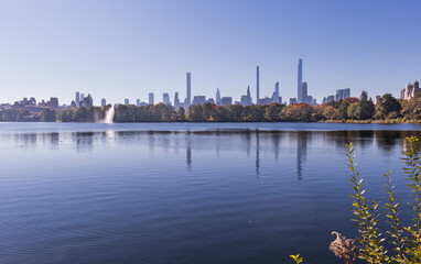 Central Park's lagoon with the New York's skyline 