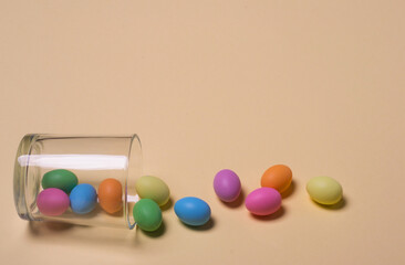 Easter. Festive composition.
Colorful Easter
 eggs on a plain background with space for text. Holiday concept