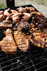 Closeup of cooked pork meat on a barbeque grill