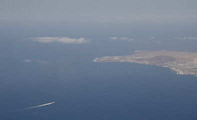Ship approaching south of Lanzarote. Punta Pechiguera. Yaiza. Canary Islands. Spain.
