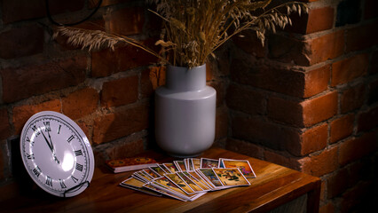 Blurred predictions background. Tarot cards layout on witch table.