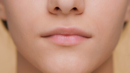 Detail shot of female lips in front of camera