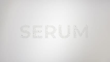 Word serum printed on the wet glass on grey background | moisturizing serum advertisement