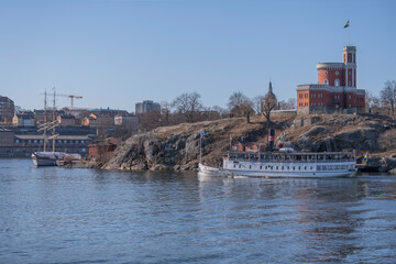 Rebuilt old previous steam ship m/s Östanå passing the island Kastellholmen on a sightseeing tour...