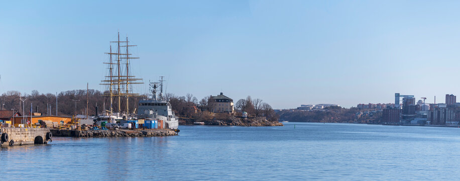Panorama view over the bay Saltsj&ouml;n the wharf island Beckholmen with boats, old museum Waldemars Udde and the district Nacka a sunny spring day in Stockholm