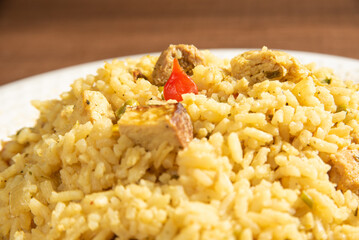 Vegan food, vegan risotto on a white plate, over wood, selective focus.