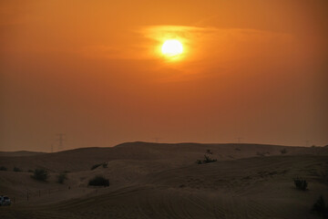 アラビア砂漠に沈む太陽