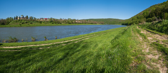 Amazing spring view on the Dnister River Canyon. View from Nezvysko village blossoming river coast,.Ivano-Frankivsk region, Ukraine