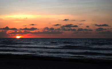 Sunrise on beach horizon