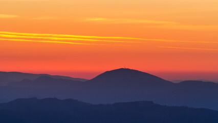 Colorful sunrise over the Schoeckl mountain near Graz in Austria