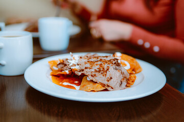 Chilaquiles dish in a restaurant