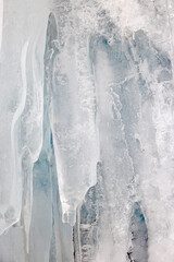 Winter nature background with blocks of ice on frozen water in spring. Abstract background of drifting ice on water. © Rechitan Sorin