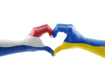 Two hands in the form of heart with Dutch and Ukrainian flag isolated on white background