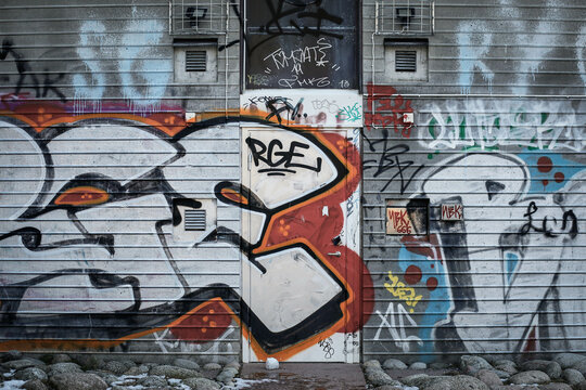 Graffiti on and old warehouse wall.