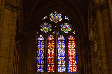 Old stone cathedral with beautiful rose windows.