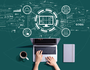 Online meeting theme with person using a laptop computer
