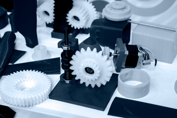 Objects printed on 3d printer made of white plastic close-up. Models created on 3D printer from...