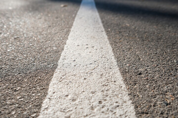 White solid line, road mark on asphalt road, right direction and success concept