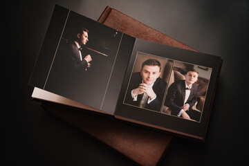 wedding photobooks in brown leather binding with photos on the cover
