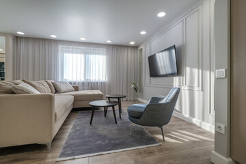 Interior of expensive living room in studio apartments or flat with sofa