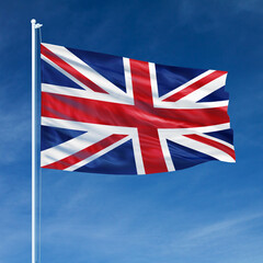 Obraz na płótnie Canvas United Kingdom Flag Flying on Flagpole