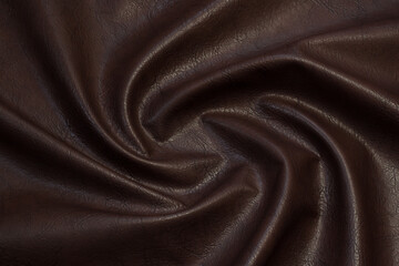 brown artificial leather with waves and folds on PVC base